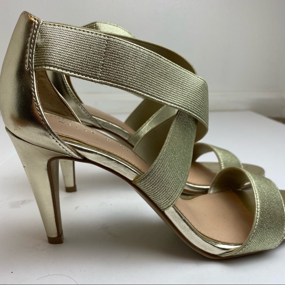 Gold strapped heels with elastic straps